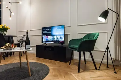 Telewizja i/lub zestaw kina domowego w obiekcie MENNICA RESIDENCE PRESTIGE Apartments