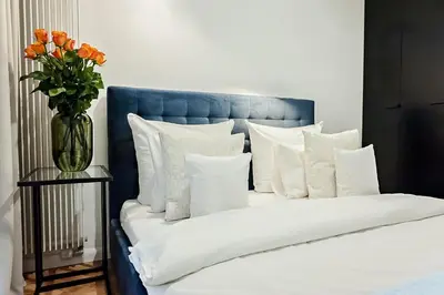 Łóżko lub łóżka w pokoju w obiekcie MENNICA RESIDENCE PRESTIGE Apartments