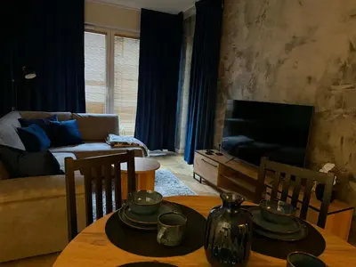 Część wypoczynkowa w obiekcie Blue Apartment Na Okrzei