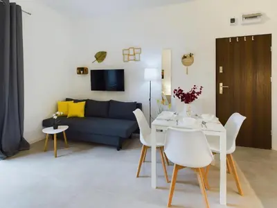 Część wypoczynkowa w obiekcie Cozy Studio with Parking - Sleeps 4 - Near Warsaw Airport
