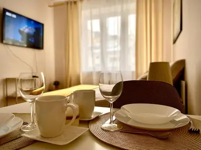 Telewizja i/lub zestaw kina domowego w obiekcie Studio 68 Apartament Warszawa Centrum