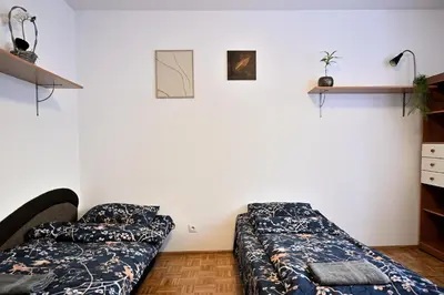 Łóżko lub łóżka w pokoju w obiekcie D&A Apartaments Wiktorska, metro Racławicka