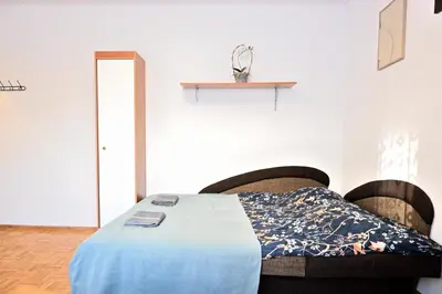 Łóżko lub łóżka w pokoju w obiekcie D&A Apartaments Wiktorska, metro Racławicka