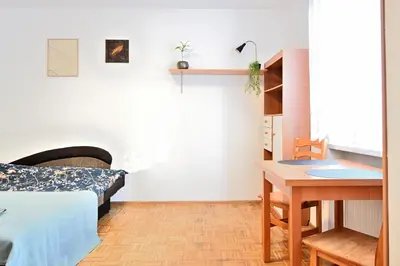 Łóżko lub łóżka w pokoju w obiekcie D&A Apartaments Wiktorska, metro Racławicka