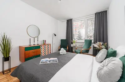 Łóżko lub łóżka w pokoju w obiekcie Lumina cozy 3-room apartment in Warsaw