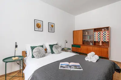 Łóżko lub łóżka w pokoju w obiekcie Lumina cozy 3-room apartment in Warsaw