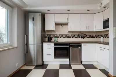 Kuchnia lub aneks kuchenny w obiekcie Ogród Saski Harmony Apartment by BookingHost