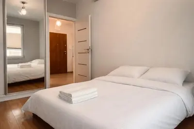 Łóżko lub łóżka w pokoju w obiekcie Elegancki apartament hotelowy - 2 pokoje