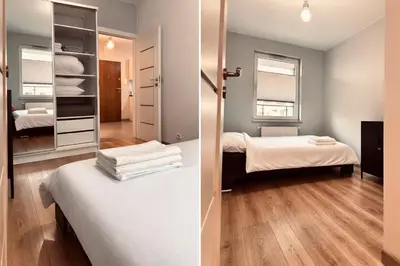 Łóżko lub łóżka w pokoju w obiekcie Elegancki apartament hotelowy - 2 pokoje