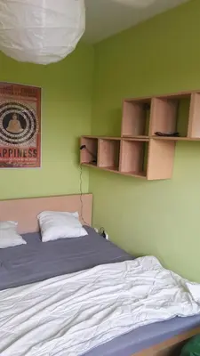 Łóżko lub łóżka w pokoju w obiekcie Apartment w zielonej części Warszawy