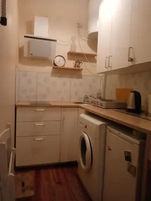 Kuchnia lub aneks kuchenny w obiekcie Cozy apartment in Warsaw's Praga Północ
