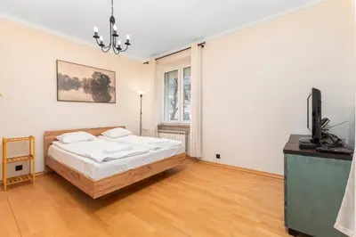 Łóżko lub łóżka w pokoju w obiekcie Al Waszyngtona 142 by Homeprime
