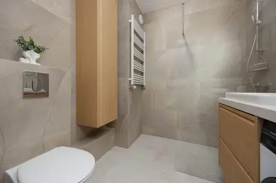 Łazienka w obiekcie Unique Studio for 4 Guests with Underground Parking by Noclegi Renters