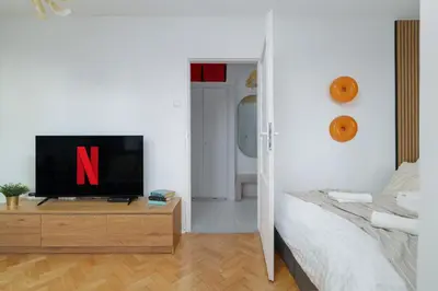 Telewizja i/lub zestaw kina domowego w obiekcie LYNA Home Gold - Manhattan View