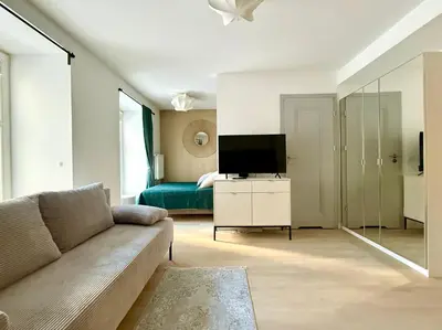 Telewizja i/lub zestaw kina domowego w obiekcie Cozy Stay Kępna Apartment
