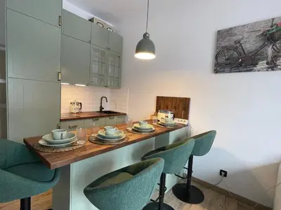 Kuchnia lub aneks kuchenny w obiekcie top apartment in the warsaw city center