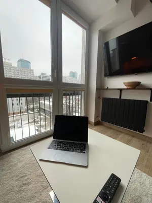 Telewizja i/lub zestaw kina domowego w obiekcie top apartment in the warsaw city center