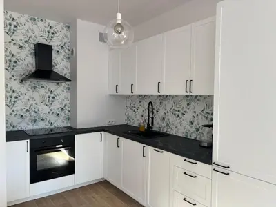 Kuchnia lub aneks kuchenny w obiekcie Apartament Branickiego 11