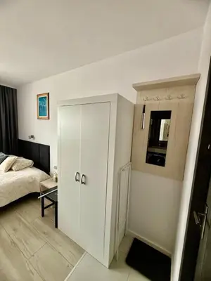 Łóżko lub łóżka w pokoju w obiekcie A&Y StudioApartments Galeria Mokotów Modzelewskiego