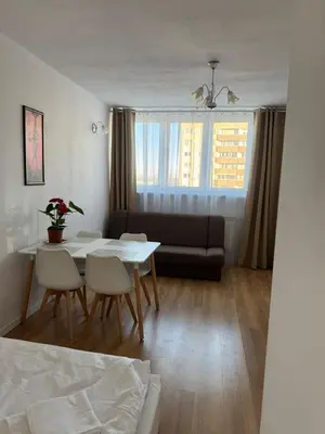 Łóżko lub łóżka w pokoju w obiekcie Czerniakowska 42