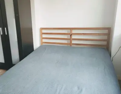 Łóżko lub łóżka w pokoju w obiekcie Apartamenty Stary Mokotów