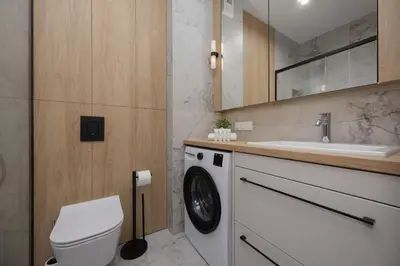 Łazienka w obiekcie Comfortable Apartment in Warsaw for 4 Guests with Underground Parking by Noclegi Renters