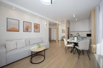 Kuchnia lub aneks kuchenny w obiekcie Comfortable Apartment in Warsaw for 4 Guests with Underground Parking by Noclegi Renters