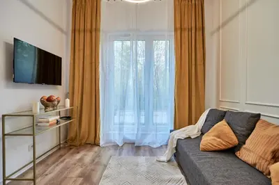 Telewizja i/lub zestaw kina domowego w obiekcie Cozy Apartment Białołęka - BOOK IT WARSAW