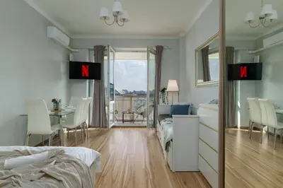 Telewizja i/lub zestaw kina domowego w obiekcie LYNA Home Gold - Parliament Residence