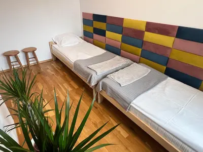Łóżko lub łóżka w pokoju w obiekcie NEST Warszawa