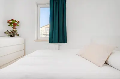 Łóżko lub łóżka w pokoju w obiekcie ShortStayPoland Daniszewska B192