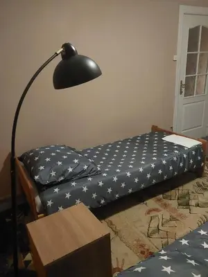 Łóżko lub łóżka w pokoju w obiekcie WKL Dom gościnny