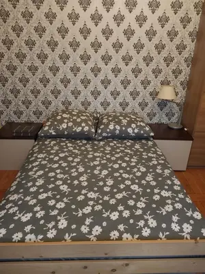 Łóżko lub łóżka w pokoju w obiekcie WKL Dom gościnny