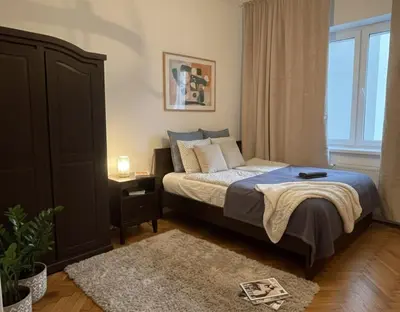 Łóżko lub łóżka w pokoju w obiekcie Intermezzo Vintage Apartment by VAYA STAYS