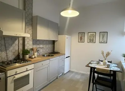 Kuchnia lub aneks kuchenny w obiekcie Intermezzo Vintage Apartment by VAYA STAYS