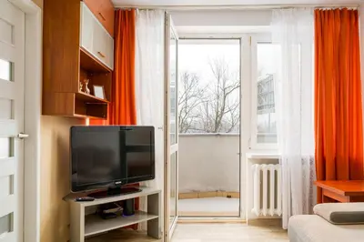 Telewizja i/lub zestaw kina domowego w obiekcie Solec Powiśle Harmony Apartment by BookingHost