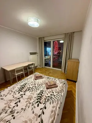 Łóżko lub łóżka w pokoju w obiekcie Vistula Point