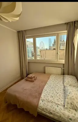 Łóżko lub łóżka w pokoju w obiekcie Vistula Point