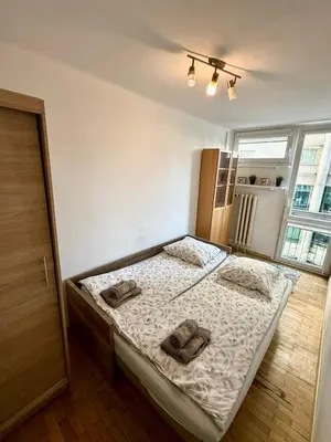Łóżko lub łóżka w pokoju w obiekcie Warsaw Prime Apartment