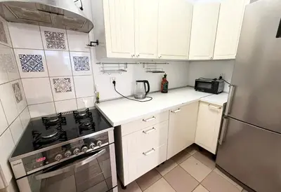 Kuchnia lub aneks kuchenny w obiekcie Warsaw Prime Apartment