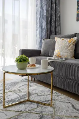Część wypoczynkowa w obiekcie Unique Apartment for 4 People with Parking in Warsaw by Noclegi Renters
