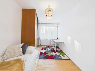 Łóżko lub łóżka w pokoju w obiekcie Cieszyńska SuperApart - near Wilanowska Metro