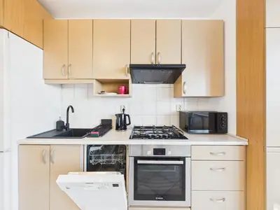 Kuchnia lub aneks kuchenny w obiekcie Cieszyńska SuperApart - near Wilanowska Metro