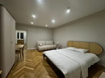 Łóżko lub łóżka w pokoju w obiekcie Cozy Wola Retreat