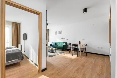 Łóżko lub łóżka w pokoju w obiekcie Zamoyskiego 37 by Homeprime Parking Free