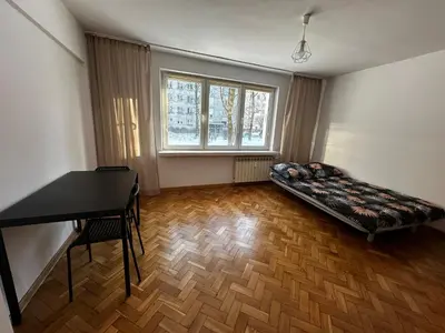 Łóżko lub łóżka w pokoju w obiekcie Central Warsaw Studio