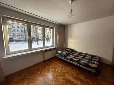 Łóżko lub łóżka w pokoju w obiekcie Central Warsaw Studio