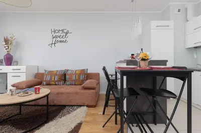 Część wypoczynkowa w obiekcie Unique Apartment with Balcony in Warsaw by Noclegi Renters