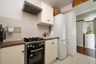 Kuchnia lub aneks kuchenny w obiekcie Czerniakowska Quantic Apartment by BookingHost