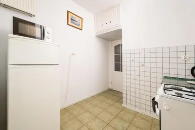 Kuchnia lub aneks kuchenny w obiekcie Park Skaryszewski Standard Apartment by BookingHost